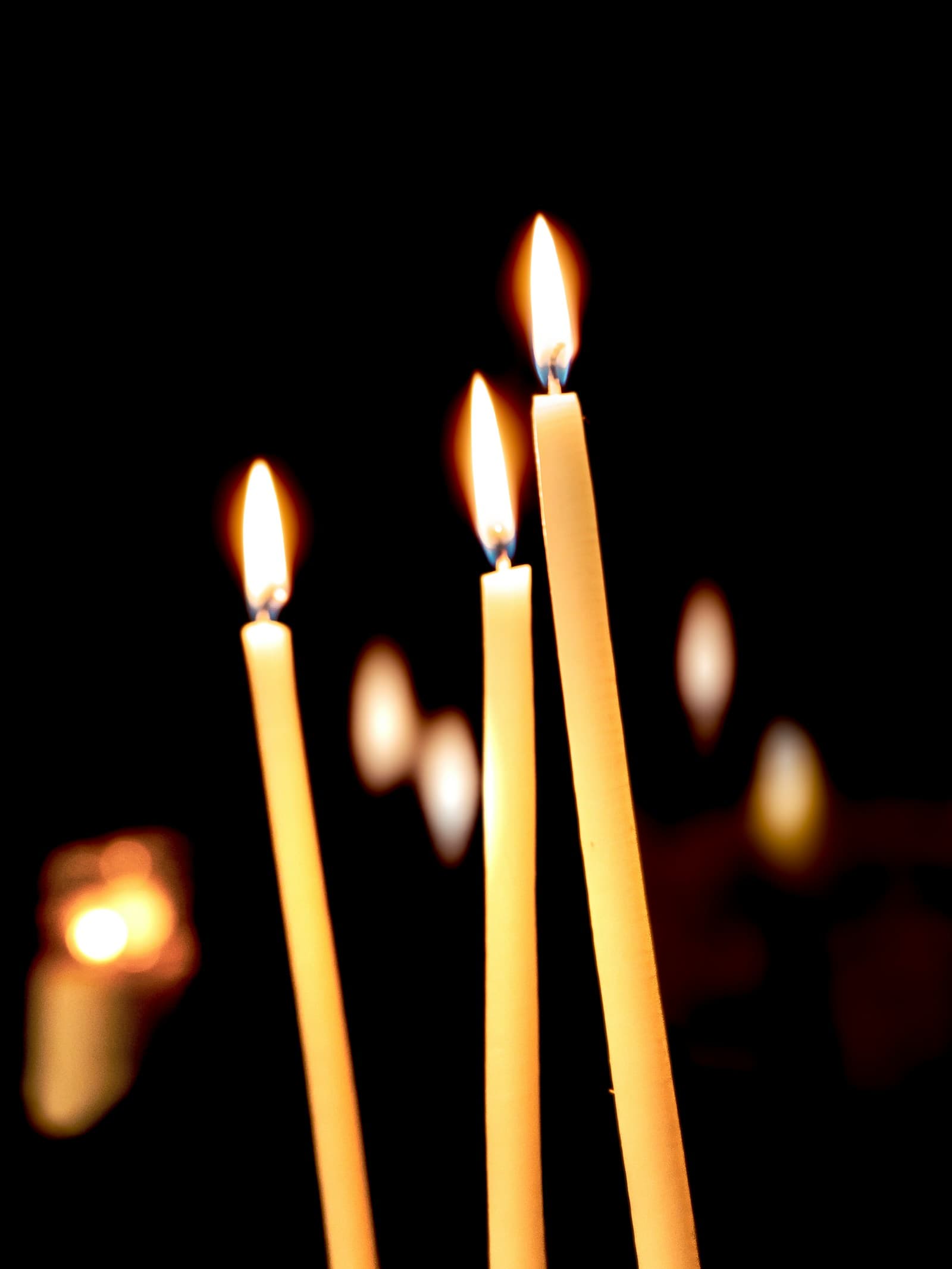 Intimate candlelit chapel at night